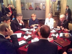 В Милане начались многосторонние переговоры по Украине при участии Порошенко и Путина